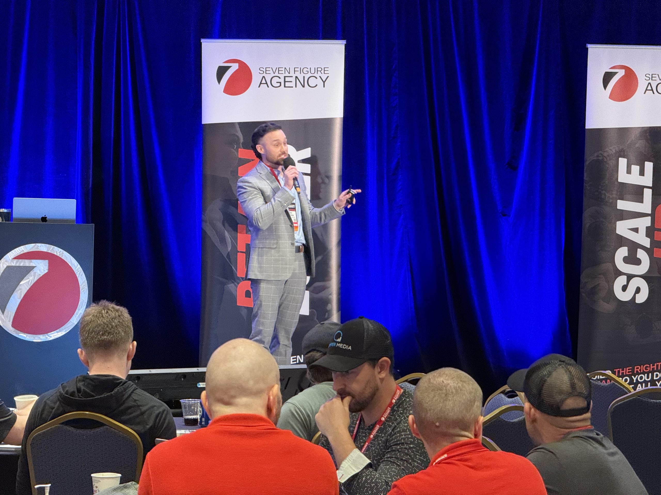 Ricky Shockley speaking at the Seven Figure Agency event